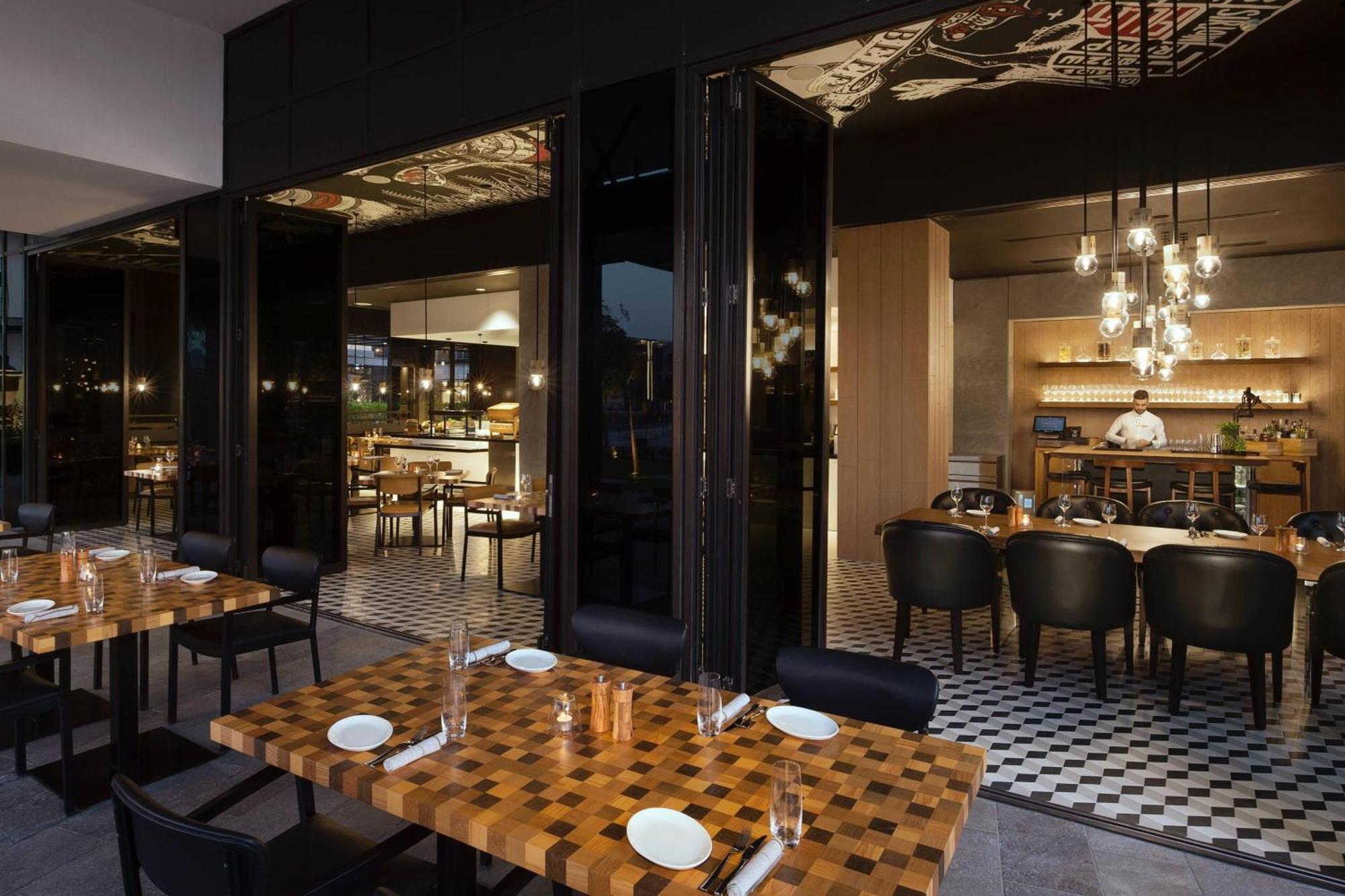 La Ville Hotel & Suites City Walk Dubai, Autograph Collection Eksteriør bilde The interior of the restaurant